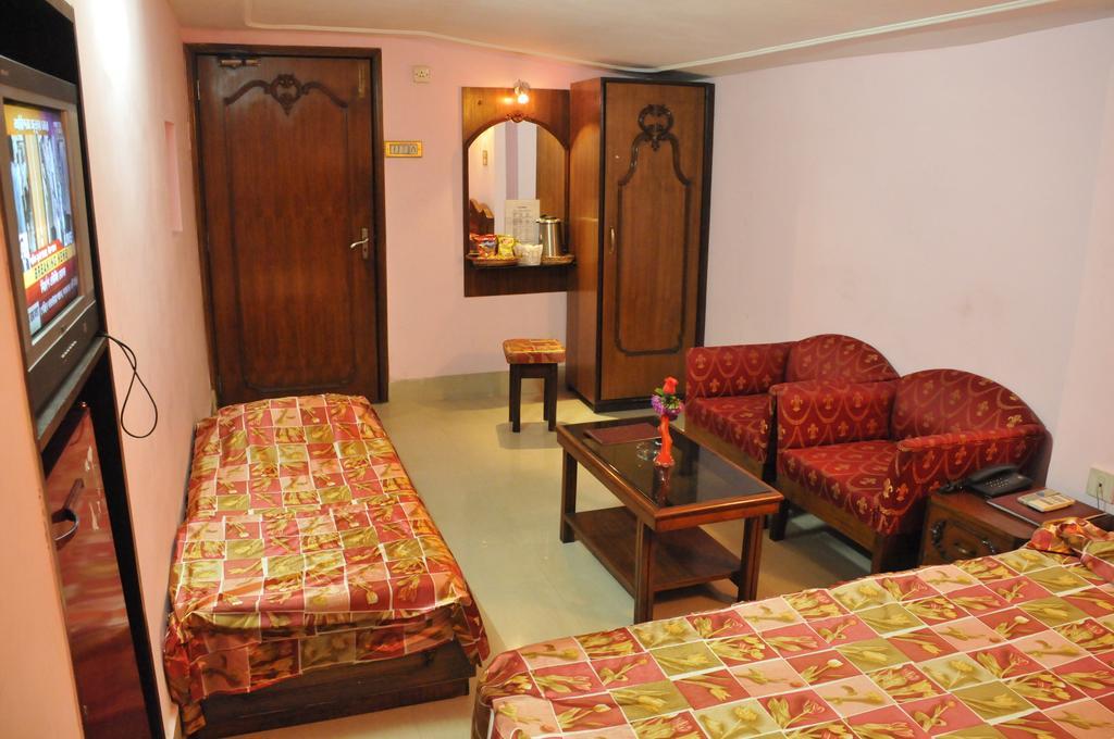 Hotel Heera Kalkata Pokoj fotografie